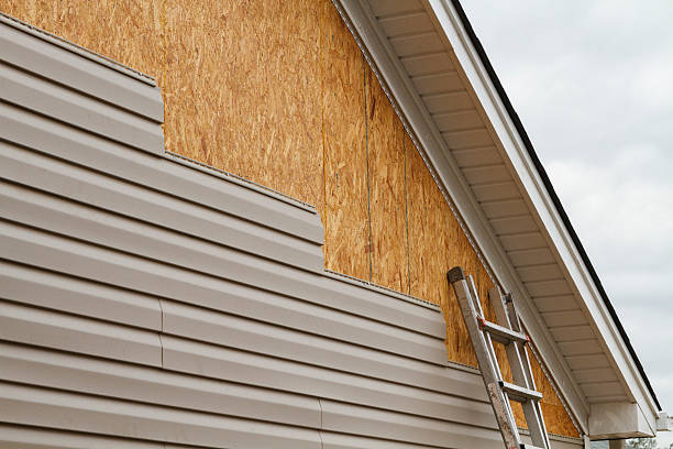 Professional Siding Contractor technician working in Oak Ridge, NC